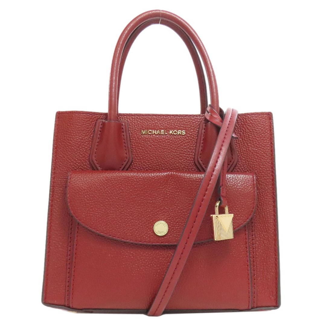 Leather Michael Kors 2WAY Handbag: Leather Michael Kors 2WAY Handbag Elevate your everyday style with the sleek and sophisticated Michael Kors 2WAY Handbag, crafted from rich light brown leather that adds a touch of warmth to any outfi