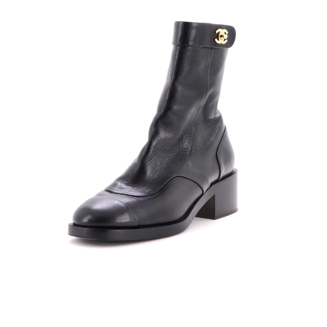 Chanel Women's CC Turnlock Cap Toe Chelsea Boots in Leather: Chanel Women's CC Turnlock Cap Toe Chelsea Boots in Leather Elevate your shoe game with the iconic Chanel Women's CC Turnlock Cap Toe Chelsea Boots in sleek black leather. Crafted from premium materia