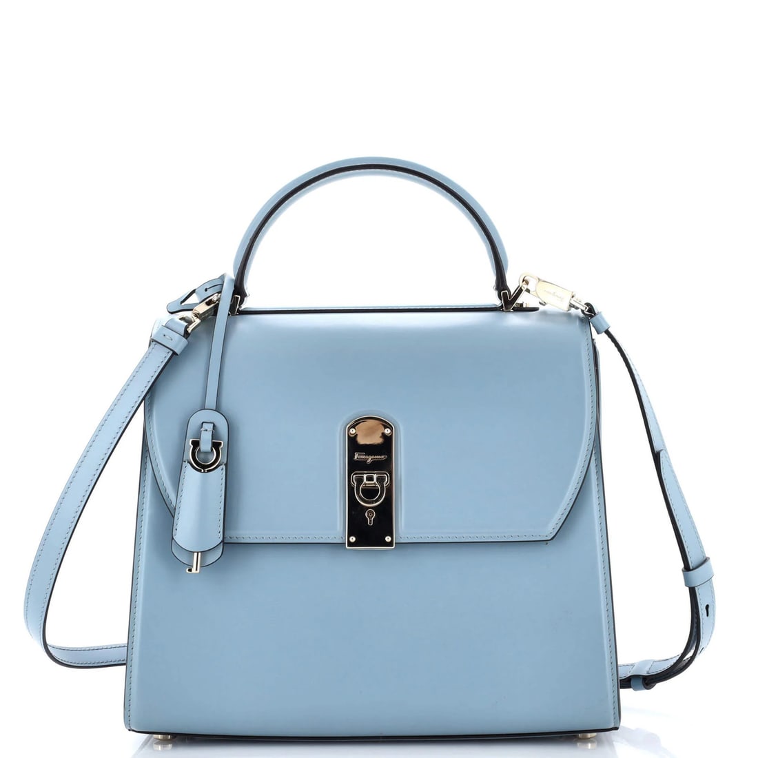 Large Salvatore Ferragamo Boxyz Top Handle Bag Leather: Large Salvatore Ferragamo Boxyz Top Handle Bag Leather Experience the timeless elegance of Salvatore Ferragamo's iconic Boxyz Top Handle Bag, crafted from rich blue leather that exudes sophistication