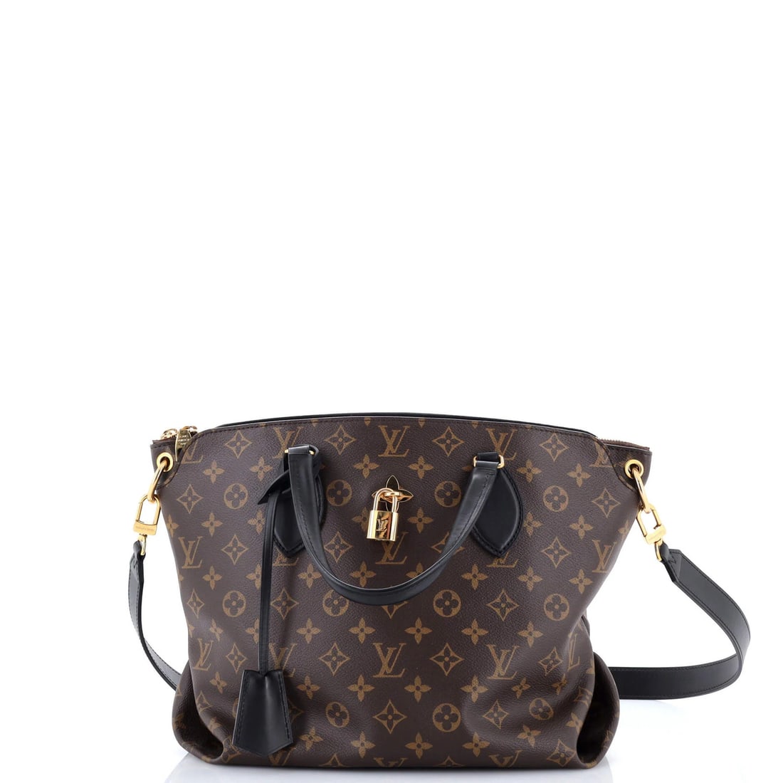 Louis Vuitton MM Monogram Canvas Flower Zipped Tote: Louis Vuitton MM Monogram Canvas Flower Zipped Tote Experience the timeless elegance of Louis Vuitton's iconic MM Monogram Canvas Flower Zipped Tote, boasting a classic brown leather exterior with sub