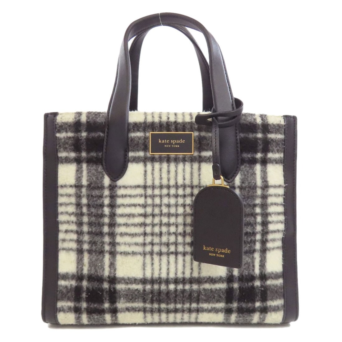 Leather kate spade Checkpattern Handbag wool: Leather kate spade Checkpattern Handbag wool Elevate your style with the iconic kate spade Checkpattern Handbag, crafted from luxurious wool and boasting a timeless black and white design that exudes