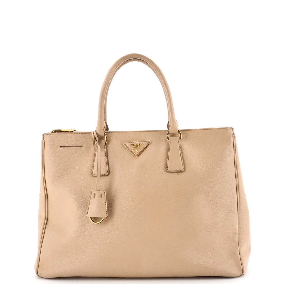 Prada Double Zip Lux Saffiano Leather Large Tote: Prada Double Zip Lux Saffiano Leather Large Tote Experience the timeless elegance of Prada's Double Zip Lux Saffiano Leather Large Tote, boasting a neutral exterior and rich gold hardware that adds a
