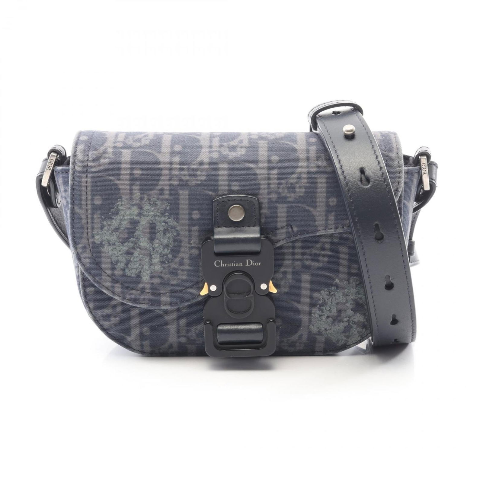 Christian Dior Canvas Shoulder Bag in Leather: Christian Dior Canvas Shoulder Bag in Leather A timeless Christian Dior canvas shoulder bag in rich navy leather, perfect for adding an air of sophistication to any outfit. With its classic design and