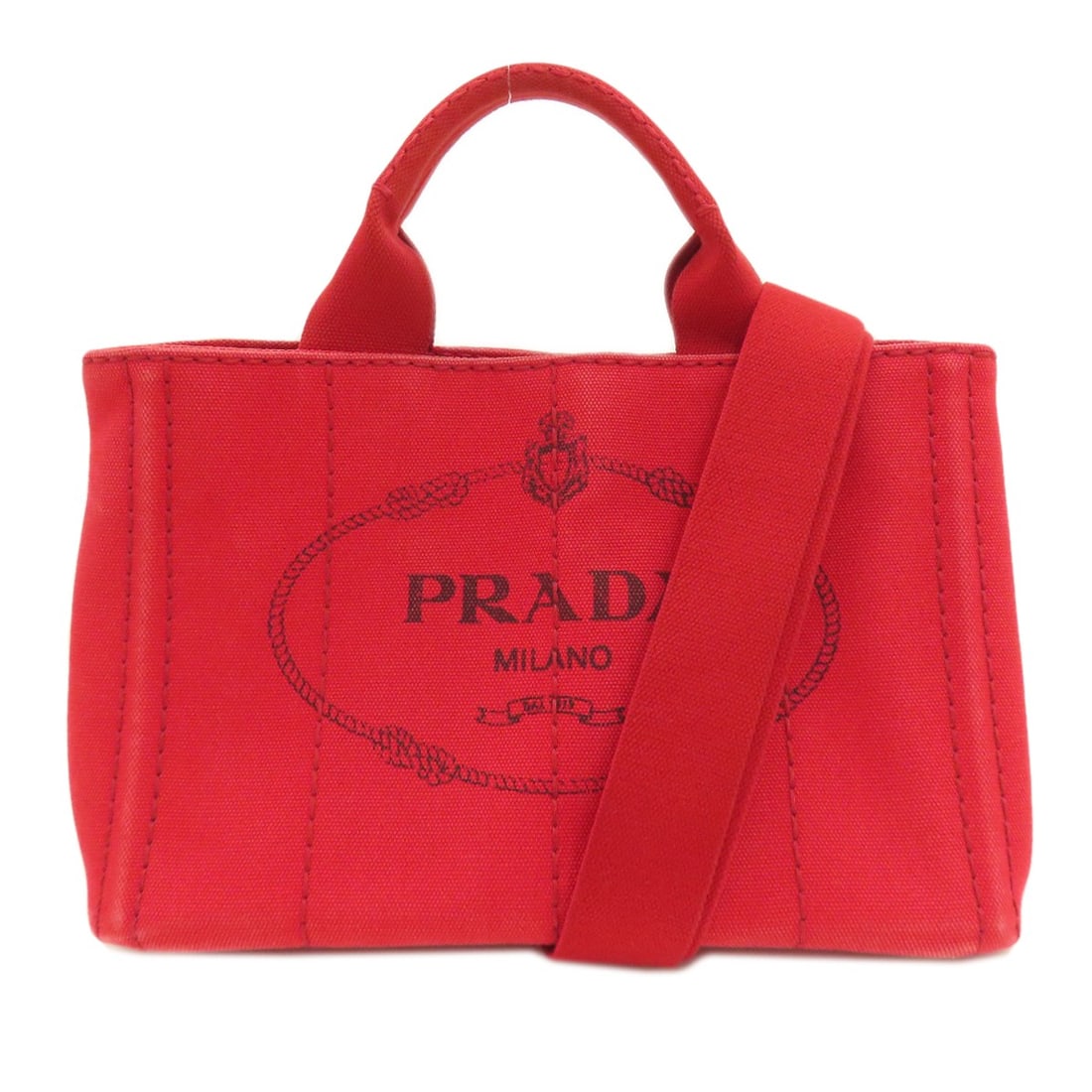 Prada Mini 2-Way Canvas Handbag: Prada Mini 2-Way Canvas Handbag The Prada Mini 2-Way Canvas Handbag is a stylish and versatile accessory that showcases the iconic Italian brand's signature canvas exterior. With its bold red hue, thi