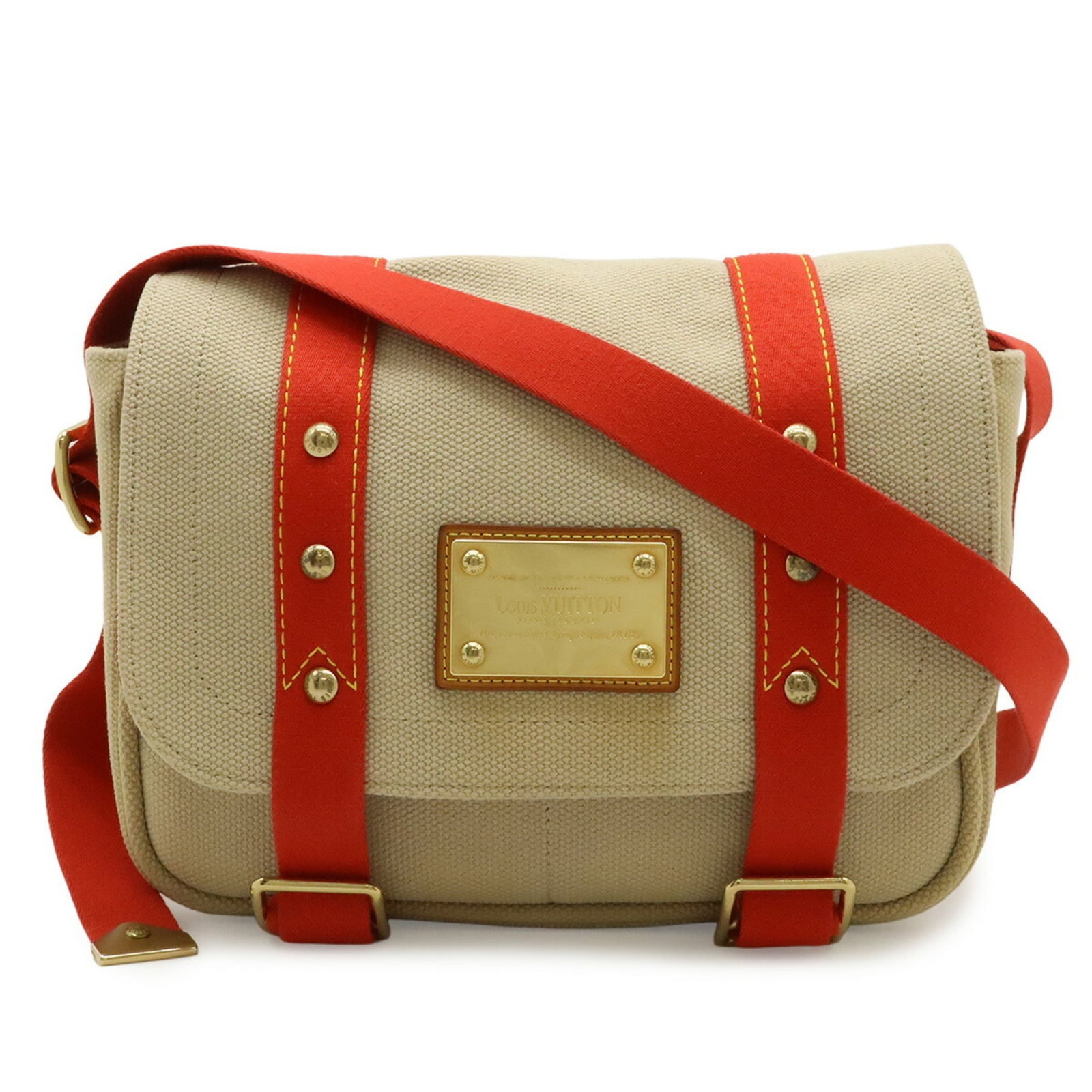 Louis Vuitton Canvas Shoulder Bag: Louis Vuitton Canvas Shoulder Bag A pre-owned Louis Vuitton canvas shoulder bag in beautiful beige and red hues, boasting the iconic LV monogram pattern on its durable canvas exterior. With its classi