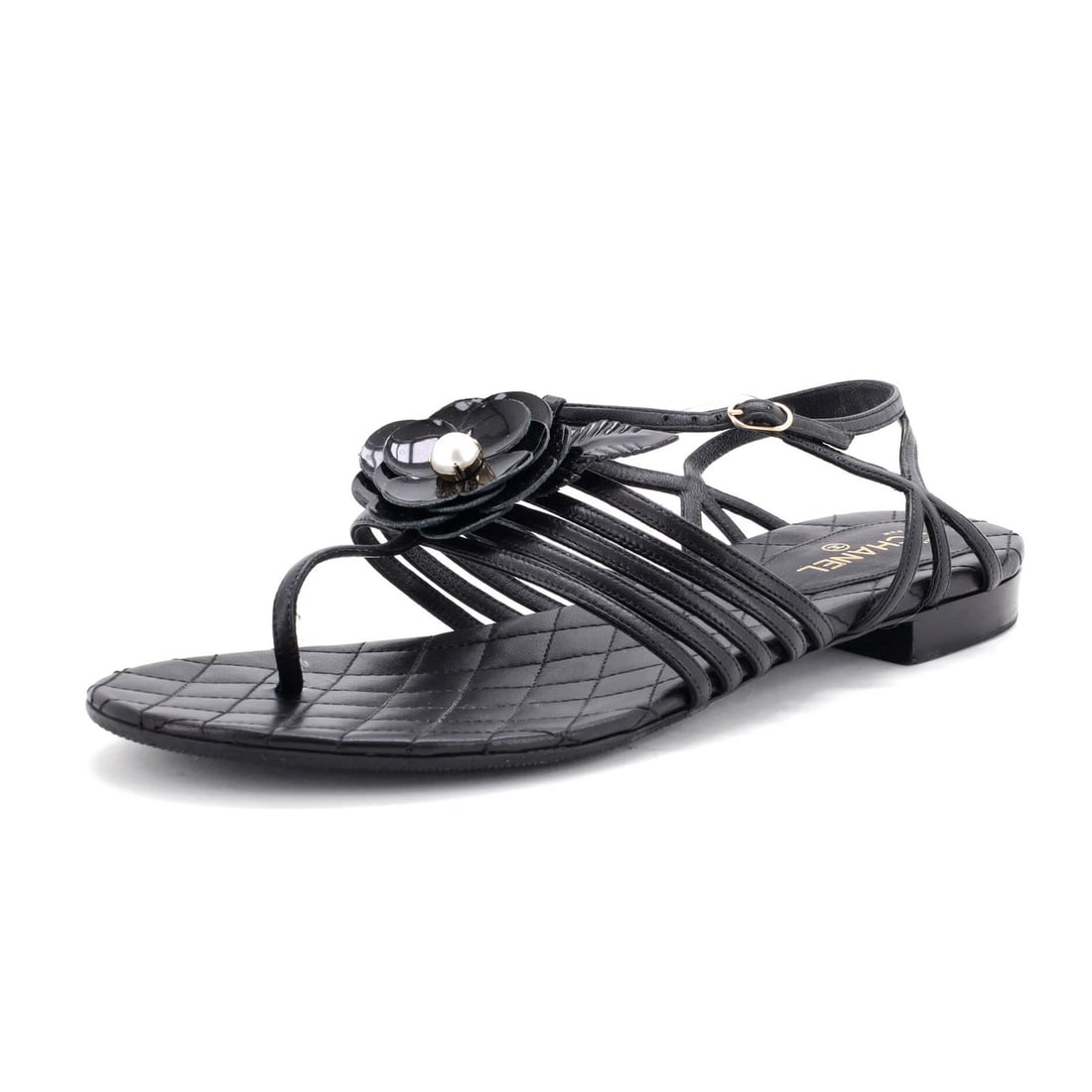 Chanel Women's Camellia T-Strap Sandals in Leather: Chanel Women's Camellia T-Strap Sandals in Leather Elevate your shoe game with the iconic Chanel Camellia T-Strap Sandals, boasting sleek leather straps and patent leather exterior in classic black. R