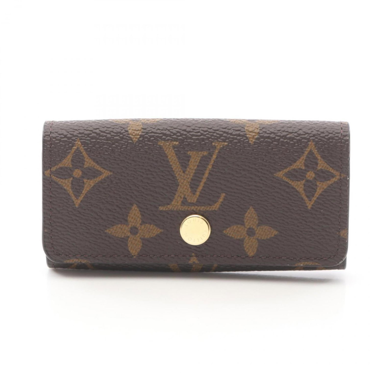 Louis Vuitton Monogram Keycase: Louis Vuitton Monogram Keycase A timeless accessory for the modern woman, this Louis Vuitton Monogram Keycase boasts the iconic brand's signature brown monogram pattern and sleek design. With its clas