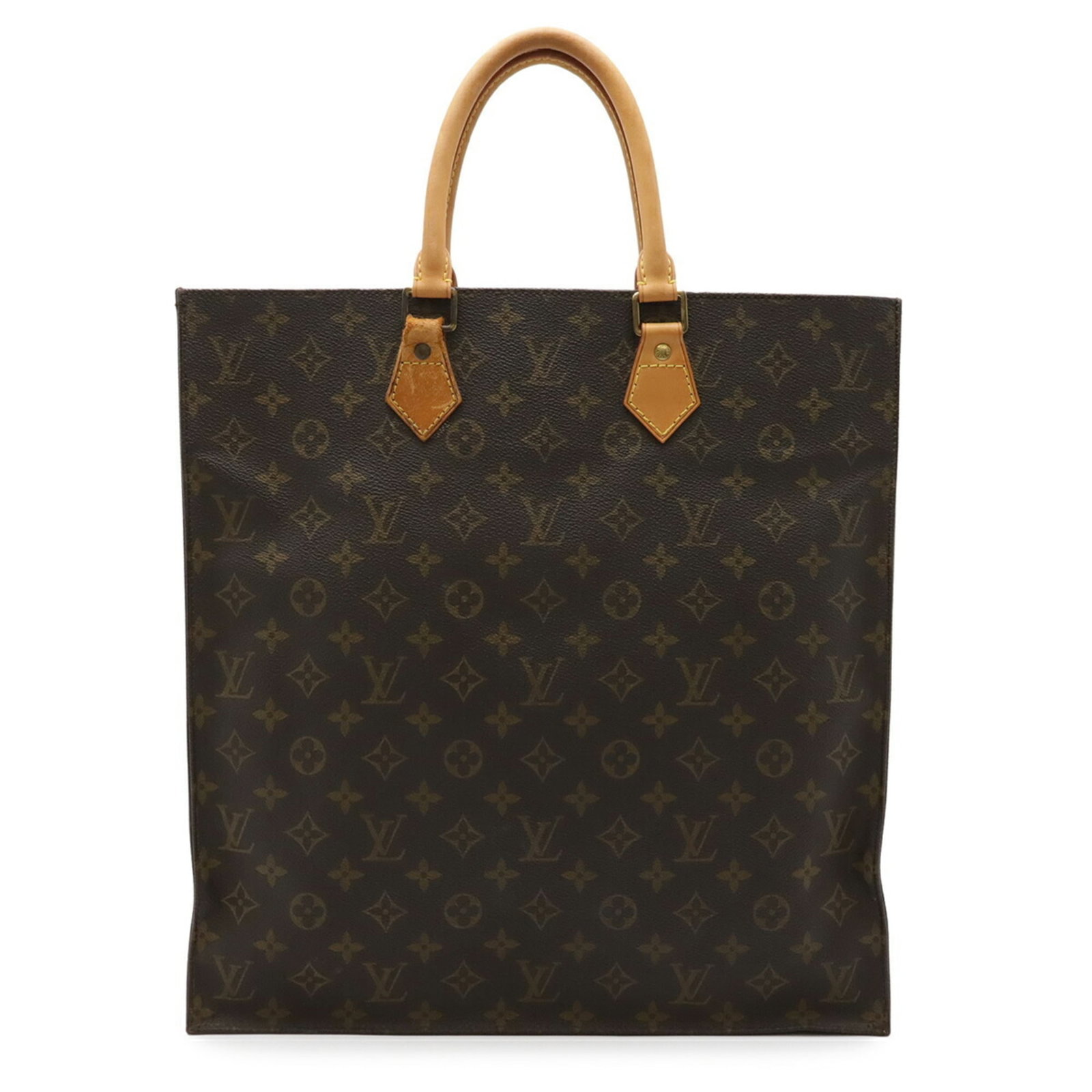 Louis Vuitton Monogram Tote Bag: Louis Vuitton Monogram Tote Bag Experience the timeless elegance of Louis Vuitton with this iconic Monogram Tote Bag, boasting the brand's signature brown monogram pattern and classic design. With its