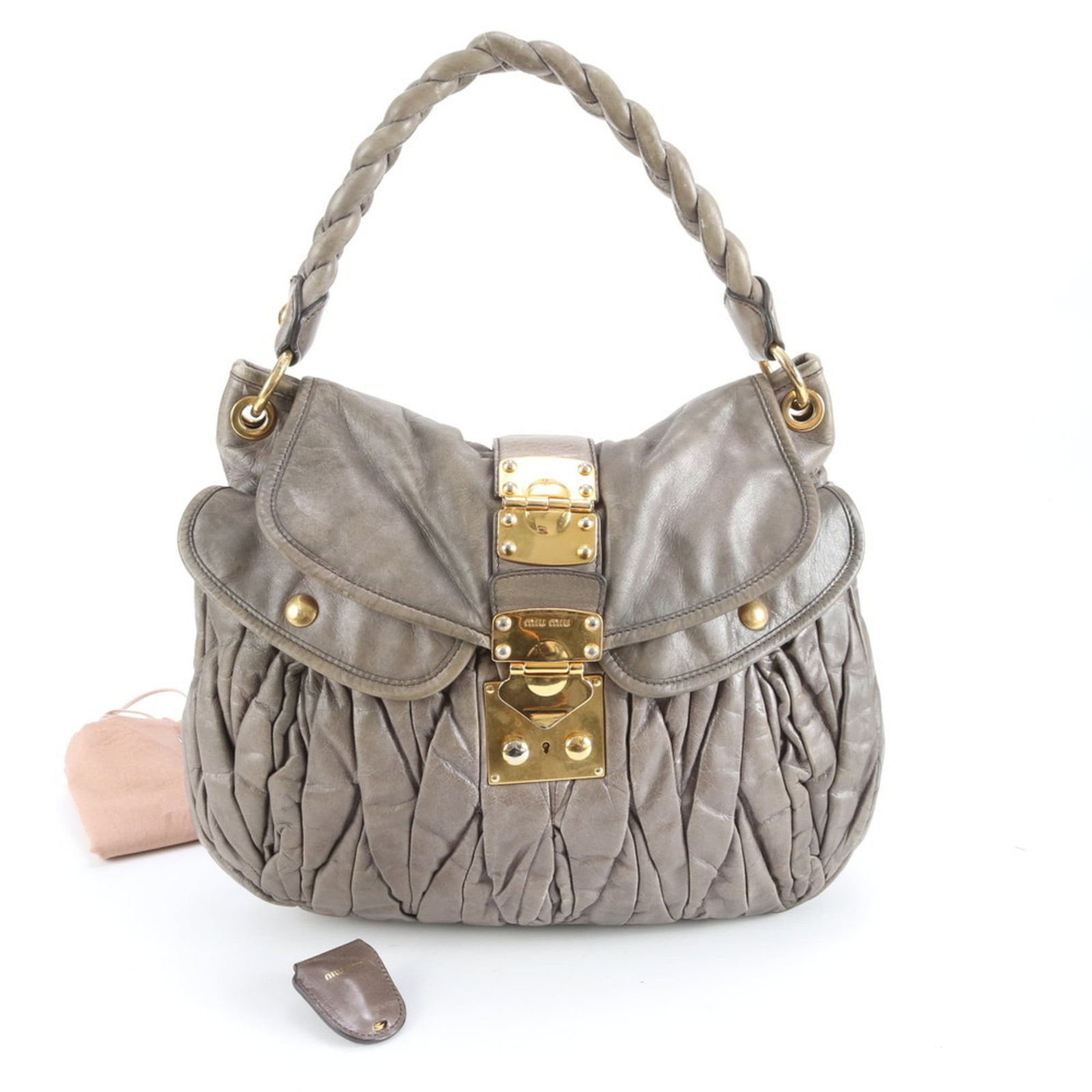 Tote Bag Leather - Miu Handbag - Shoulder Bag: Tote Bag Leather - Miu Handbag - Shoulder Bag Elevate your daily style with the Miu Miu tote bag, crafted from rich leather in a vibrant green hue. This chic shoulder bag boasts a timeless design, mea