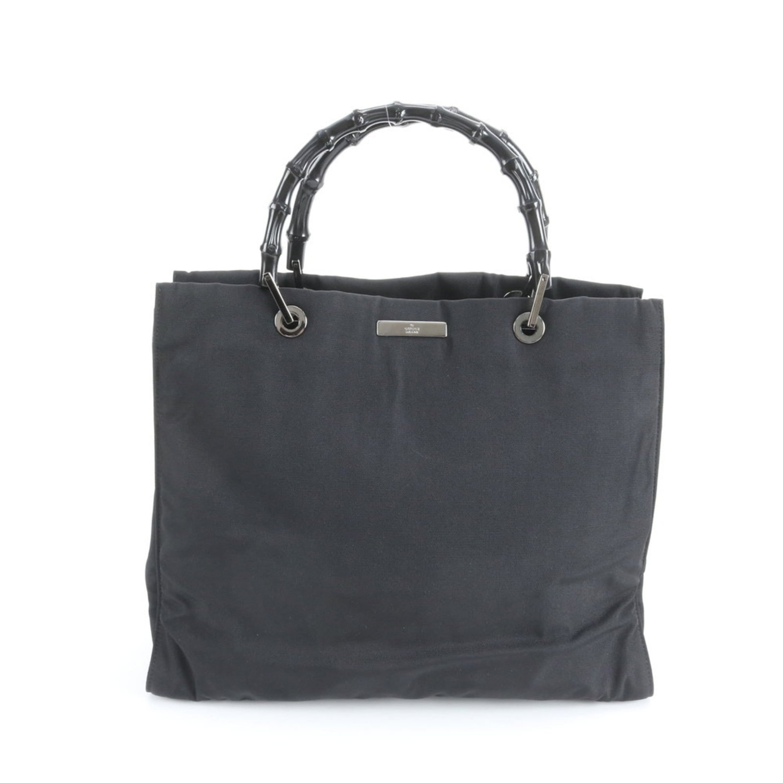 Gucci Tote Bag in Leather and Nylon: Gucci Tote Bag in Leather and Nylon Elevate your everyday with the iconic Gucci Tote Bag, crafted from luxurious leather and durable nylon. This versatile and stylish bag boasts a sleek black design t