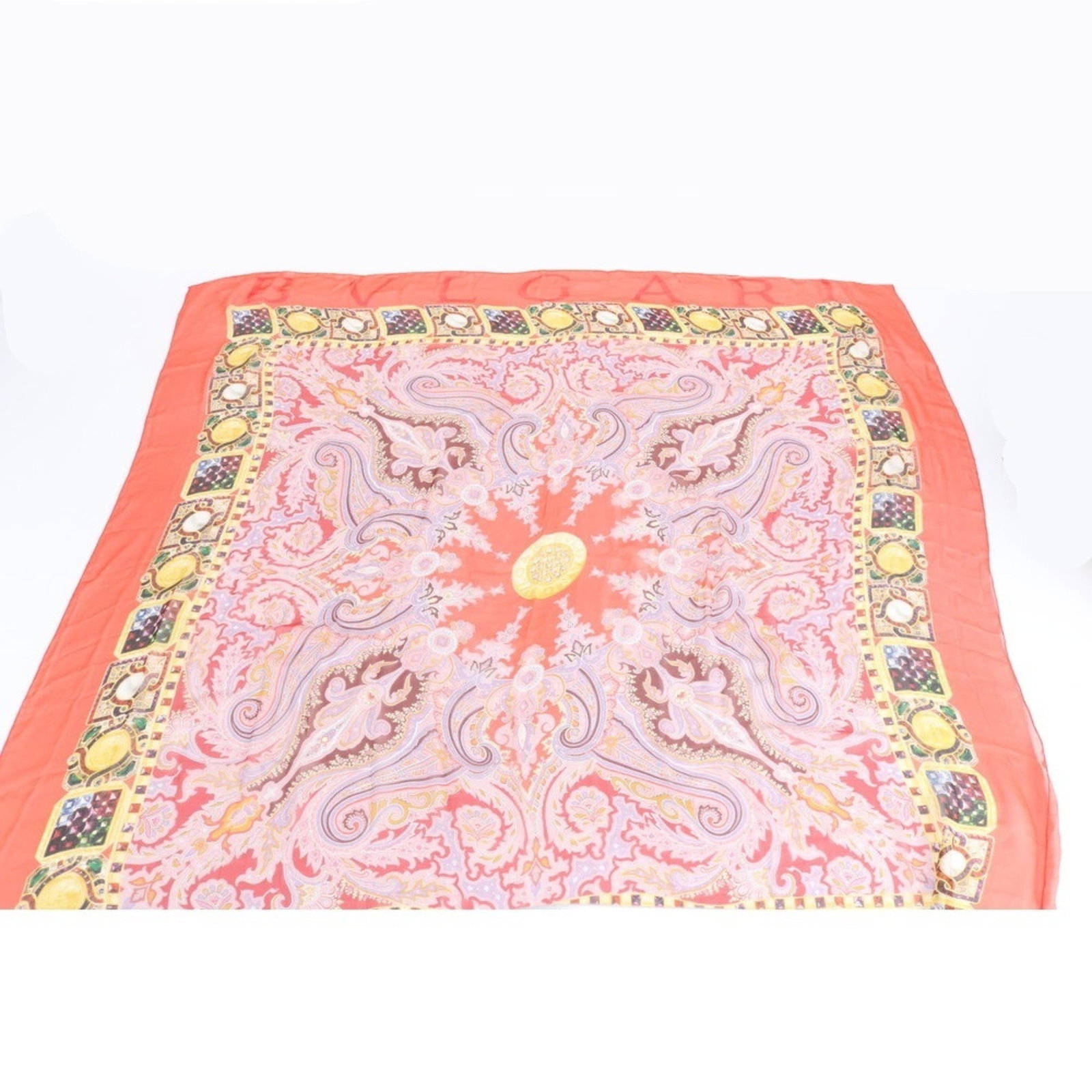 Bvlgari Silk Scarf: Bvlgari Silk Scarf Elevate your style with the iconic Bvlgari Silk Scarf, featuring a vibrant multi-color design that adds a pop of personality to any outfit. Made from luxurious silk, this scarf boas