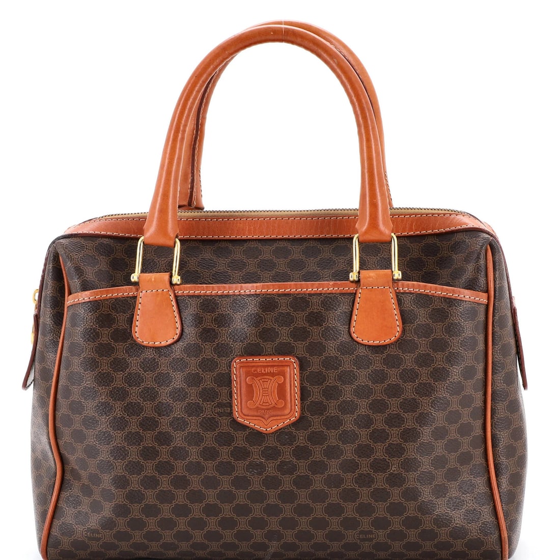 Celine Vintage Boston Bag in Medium Macadam Coated Canvas: Celine Vintage Boston Bag in Medium Macadam Coated Canvas A rare opportunity to own a vintage Celine Boston Bag, this medium-sized beauty boasts a striking macadam coated canvas exterior in rich brown