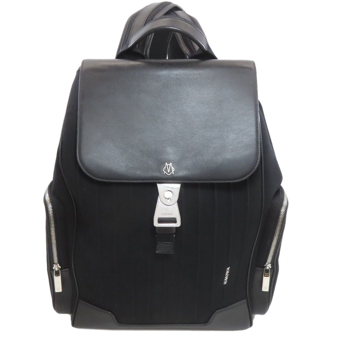 Rimowa Leather Canvas Daypack Backpack: Rimowa Leather Canvas Daypack Backpack Elevate your daily routine with the sleek and sophisticated Rimowa Leather Canvas Daypack Backpack, boasting premium leather exterior, durable canvas interior, a