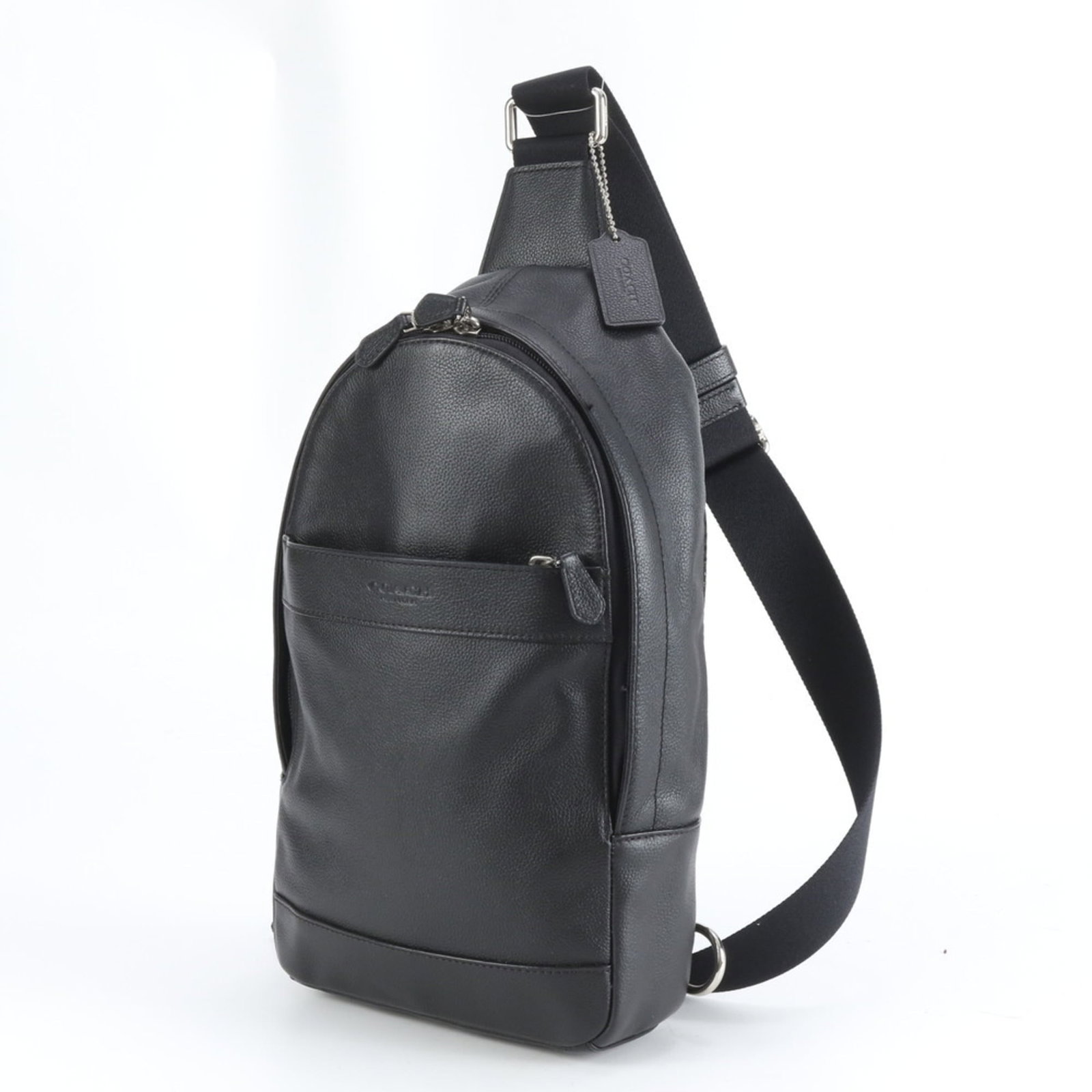 Coach Sling Bag in Leather: Coach Sling Bag in Leather A sleek and versatile leather sling bag from Coach, perfect for everyday use, boasts a timeless black design that exudes sophistication. With its durable leather constructio