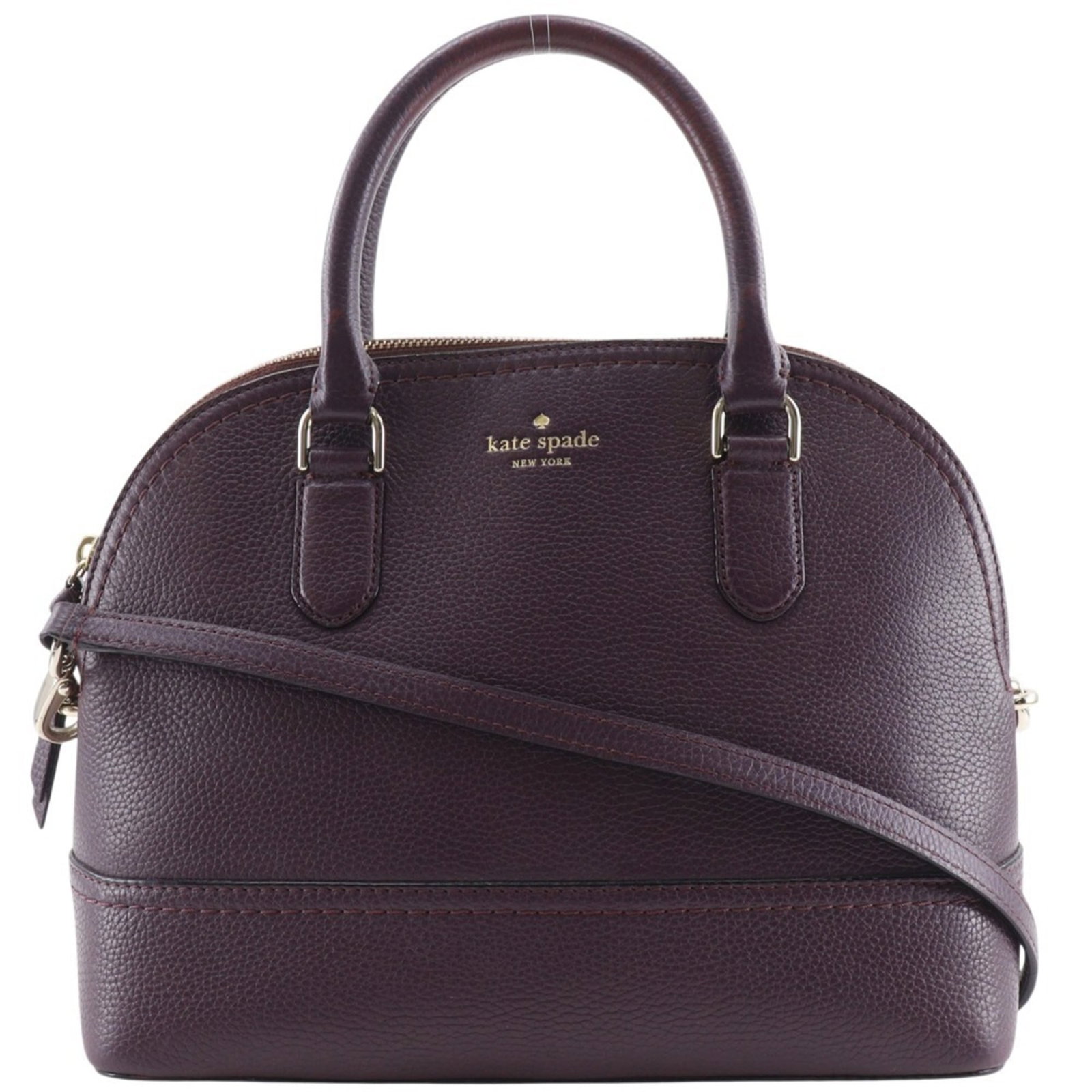 Kate Spade Leather Handbag: Kate Spade Leather Handbag A stunning Kate Spade leather handbag in rich purple, this versatile tote boasts a sleek zipper closure and spacious interior perfect for daily essentials. With its sturdy l