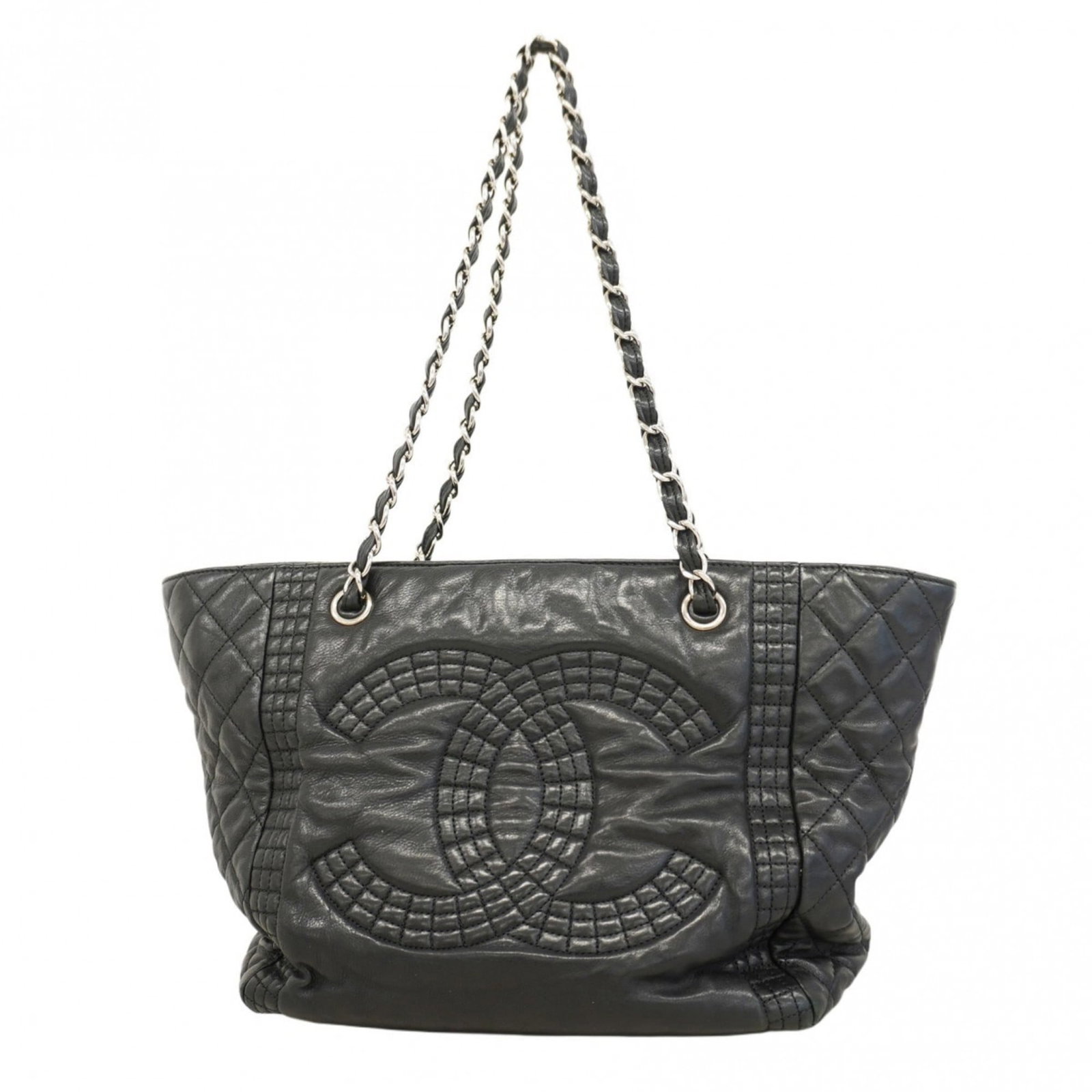 Leather Chanel Tote Bag: Leather Chanel Tote Bag A timeless and sophisticated leather tote bag from the iconic Chanel brand, crafted from high-quality calfskin leather in sleek black. With its classic design and elegant