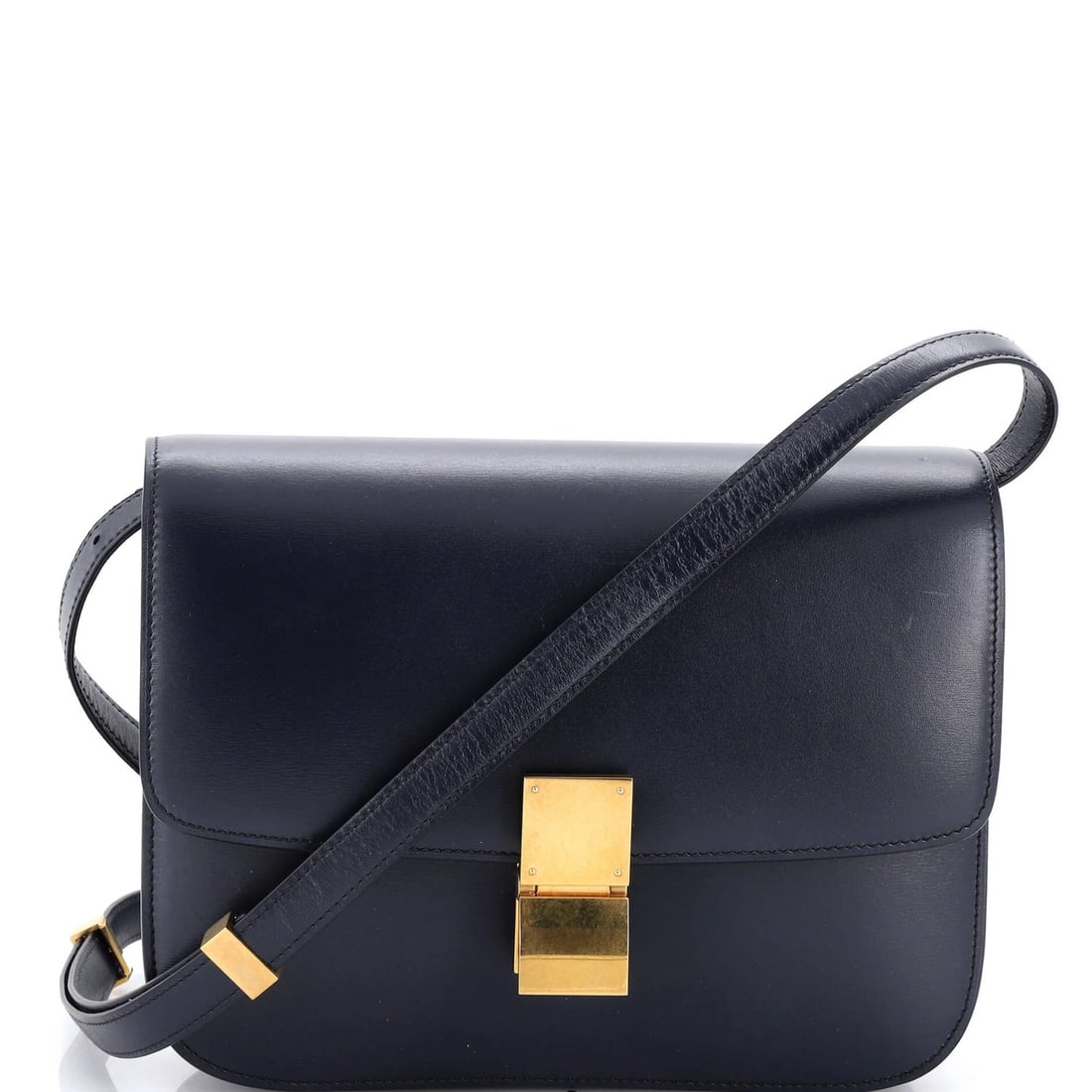 Celine Classic Box Bag in Smooth Medium Leather: Celine Classic Box Bag in Smooth Medium Leather Experience the timeless elegance of Celine's Classic Box Bag, crafted from smooth medium leather in a stunning blue hue. With its sleek design and adjus