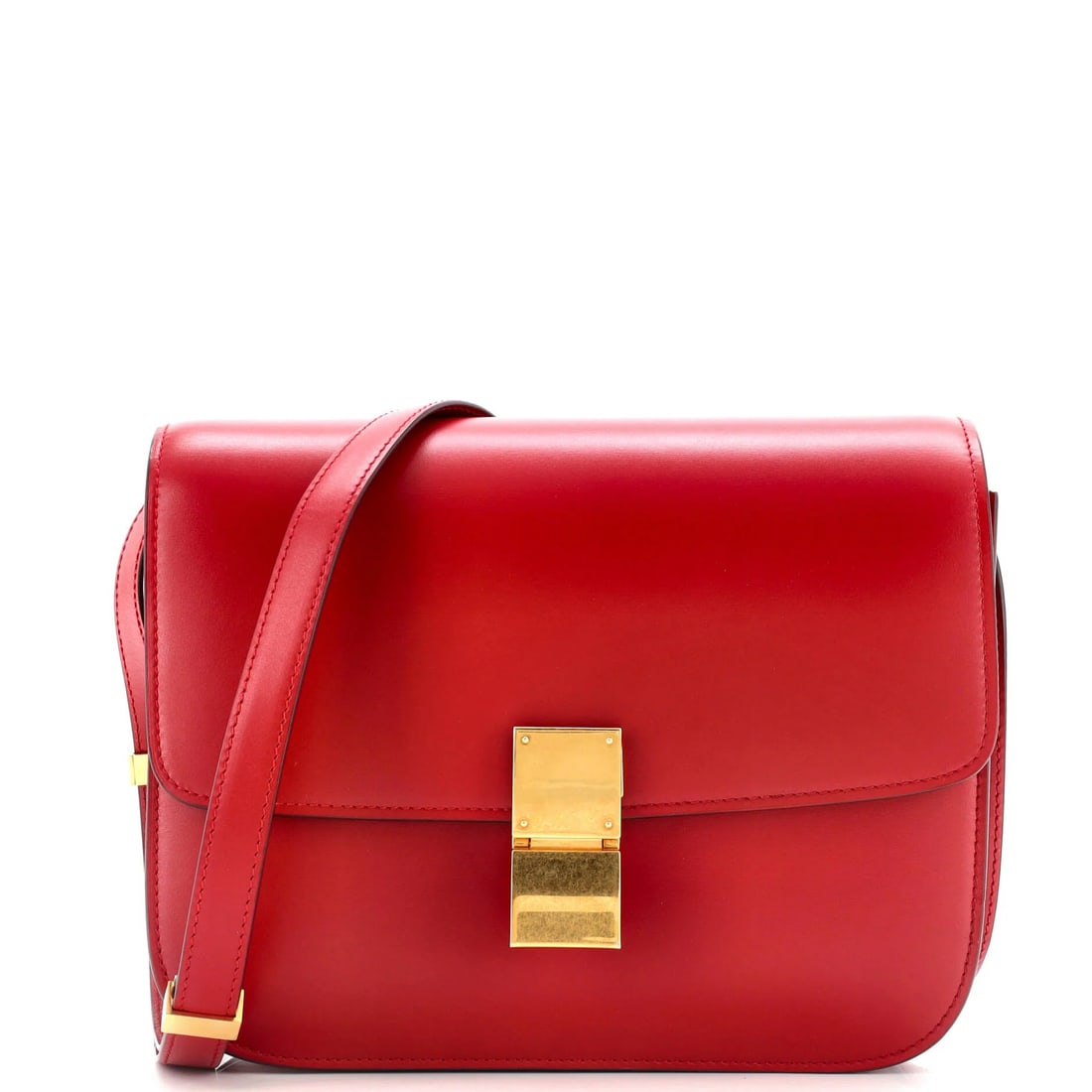 Celine Classic Box Bag in Smooth Medium Leather: Celine Classic Box Bag in Smooth Medium Leather Experience the timeless elegance of Celine's Classic Box Bag, crafted from smooth medium leather in rich red hues. With its sleek design and versatile 9