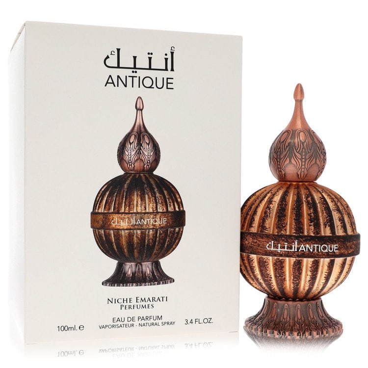 (Unisex) Niche Emarati Antique Perfume By Lattafa Eau De Parfum Spray: (Unisex) Niche Emarati Antique Perfume By Lattafa Eau De Parfum Spray Experience the rich heritage of Emirati culture with Lattafa Eau De Parfum Spray, a unique and alluring fragrance that embodies th