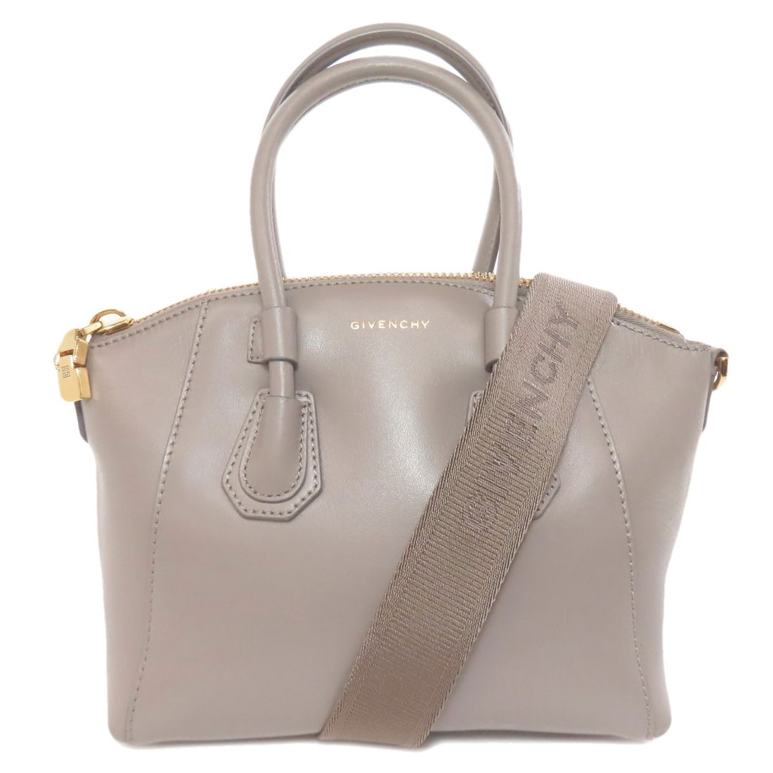 Calf GIVENCHY 2WAY Handbag: Calf GIVENCHY 2WAY Handbag Elevate your everyday style with the sleek and sophisticated GIVENCHY 2WAY handbag, crafted from high-quality calf leather in a timeless gray hue. This versatile design boas