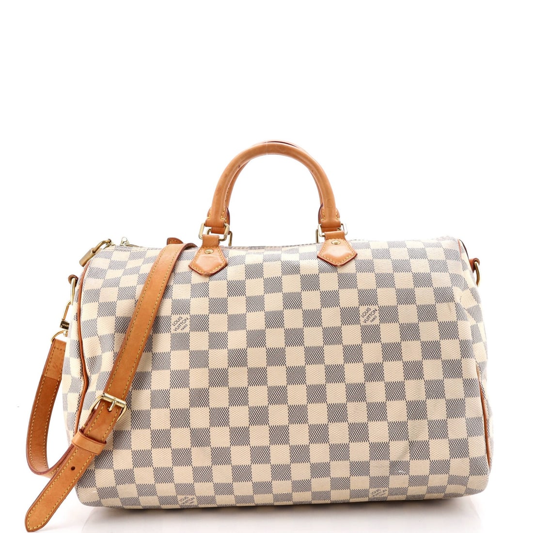 Louis Vuitton Speedy Bandouliere Bag - Damier 35: Louis Vuitton Speedy Bandouliere Bag - Damier 35 A timeless classic, the Louis Vuitton Speedy Bandouliere Bag in Damier 35 is a quintessential piece of luxury fashion. With its iconic top handle and s