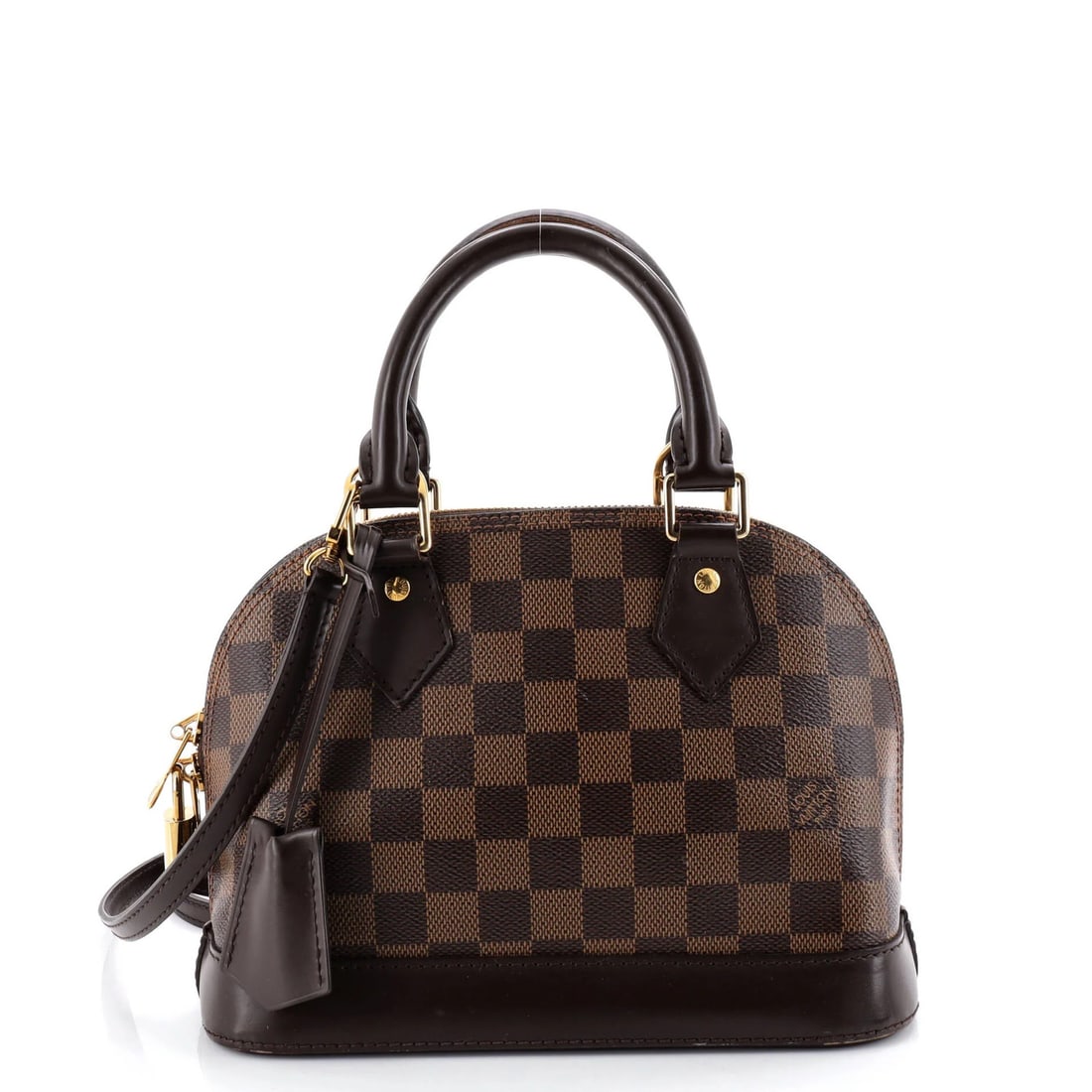Louis Vuitton Alma Handbag in Damier BB: Louis Vuitton Alma Handbag in Damier BB The iconic Louis Vuitton Alma Handbag in Damier BB exudes timeless elegance with its rich brown canvas exterior, adorned with gold hardware and red interior acc