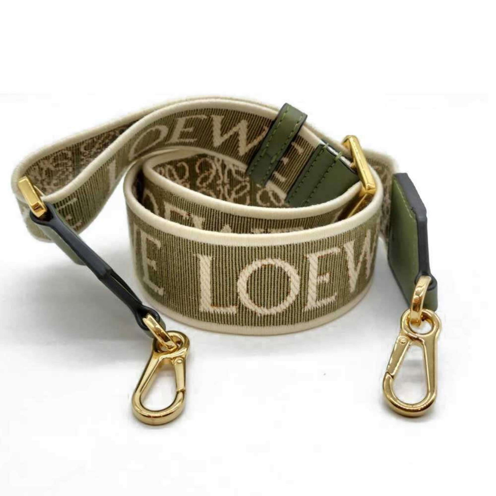 Loewe Strap Canvas Leather: Loewe Strap Canvas Leather A pre-owned Loewe Strap Canvas Leather handbag, boasting a unique canvas and leather combination, is up for grabs. With its 100cm strap length and 130g weight, this stylish