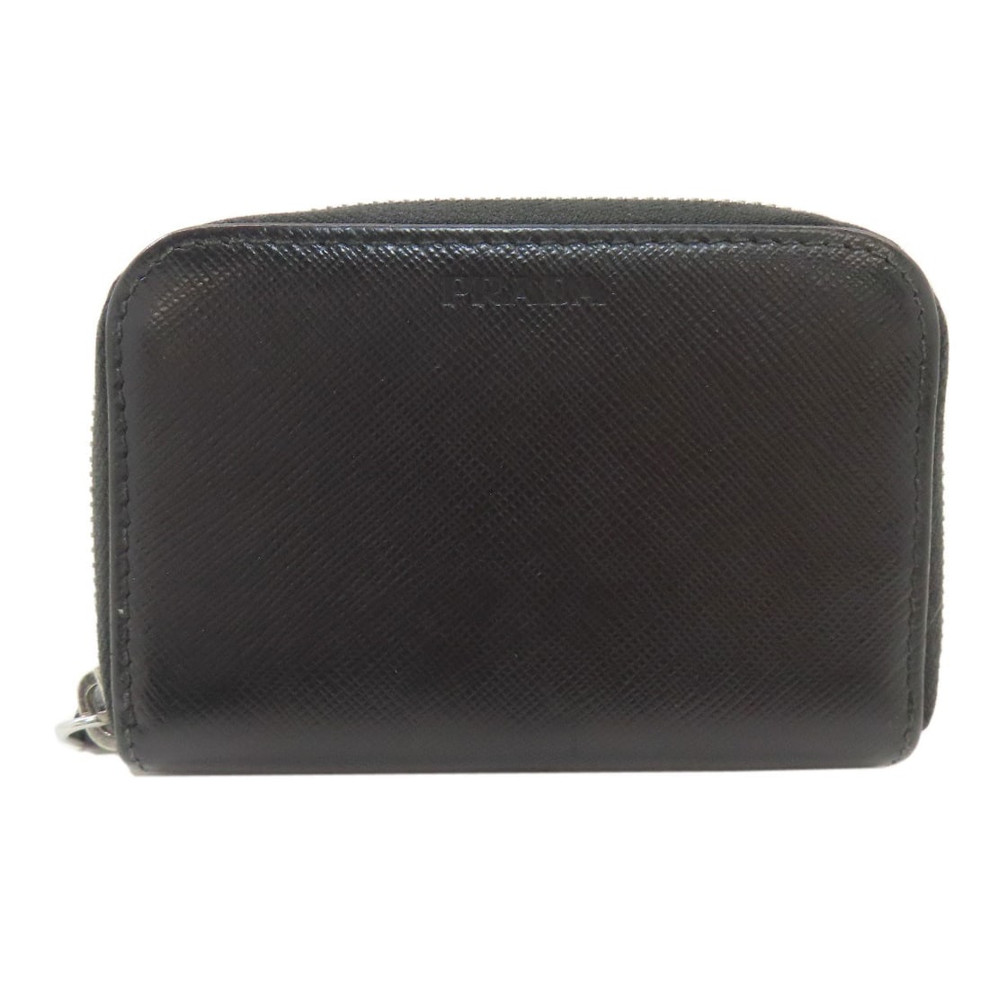 Prada Logo Coin Purse - Safiano: Prada Logo Coin Purse - Safiano A sleek and sophisticated accessory, this Prada Logo Coin Purse is crafted from high-quality Safiano material and boasts a timeless black design that exudes luxury. The