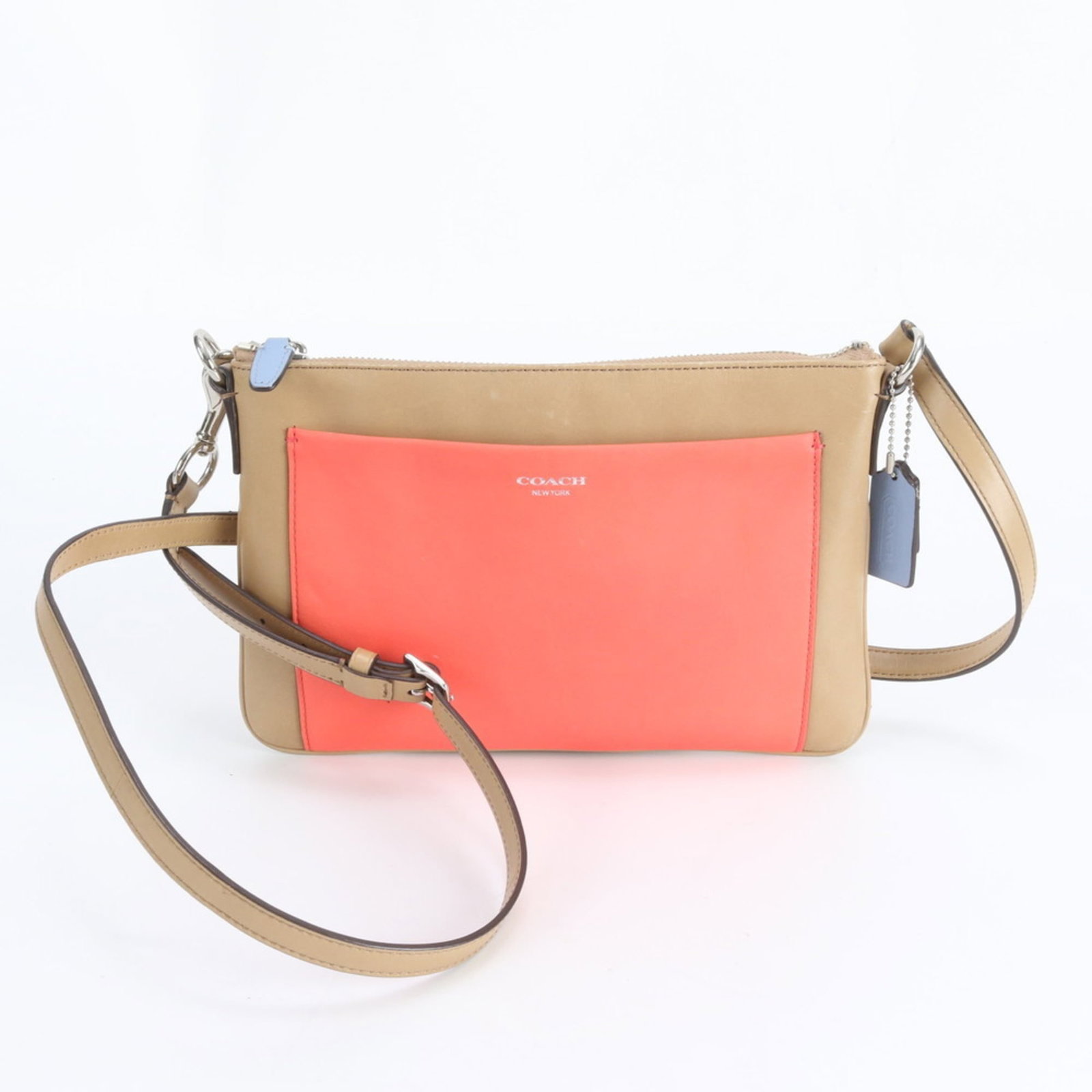 Coach Leather Shoulder Bag: Coach Leather Shoulder Bag A vibrant multi-color leather shoulder bag from Coach, perfect for adding a pop of personality to your daily routine. With its spacious interior and adjustable strap, this s