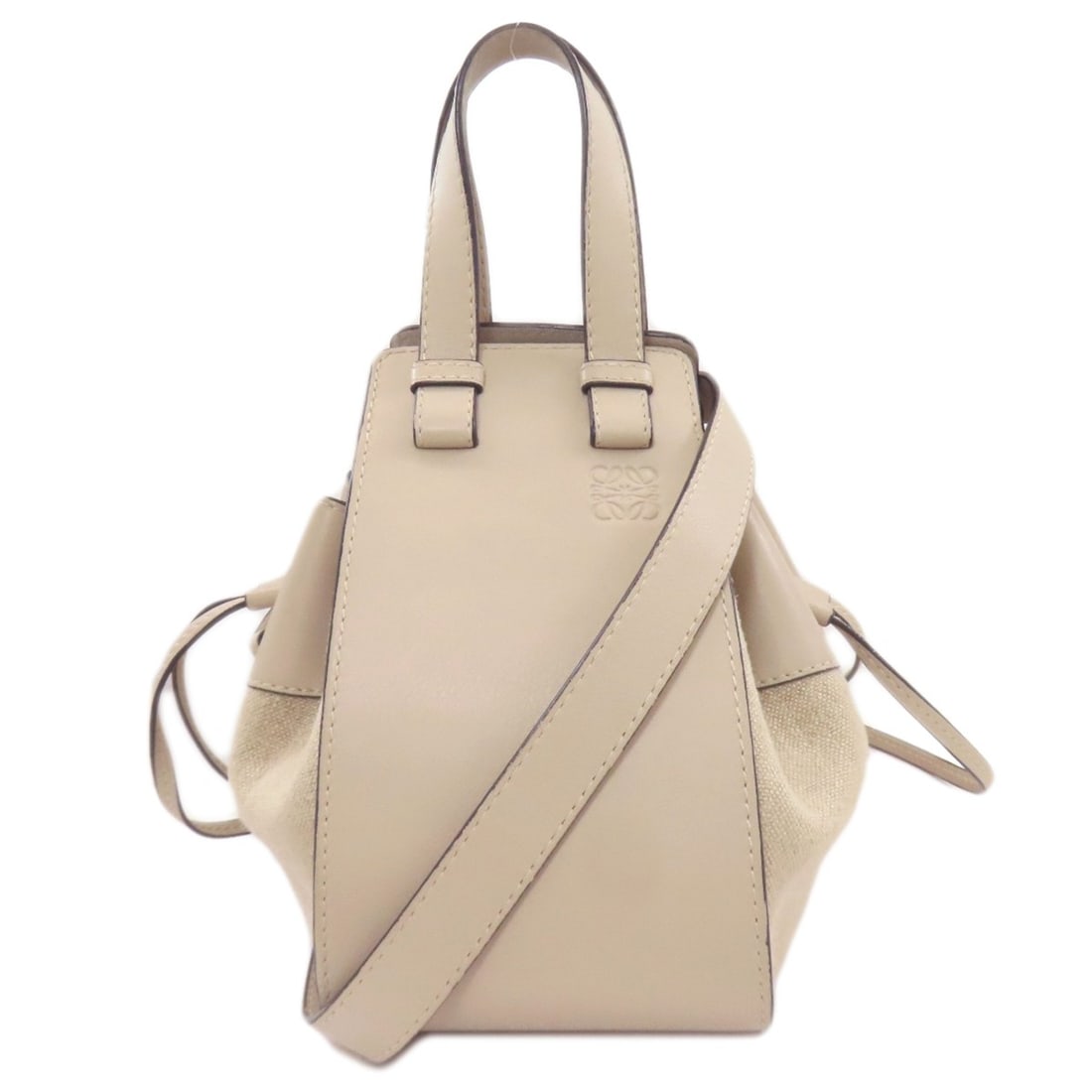 Calf LOEWE Hammock 2WAY Handbag: Calf LOEWE Hammock 2WAY Handbag Experience the timeless elegance of LOEWE with this exquisite Calf leather handbag, expertly crafted in Spain to perfection. The understated beige hue and supple calf l