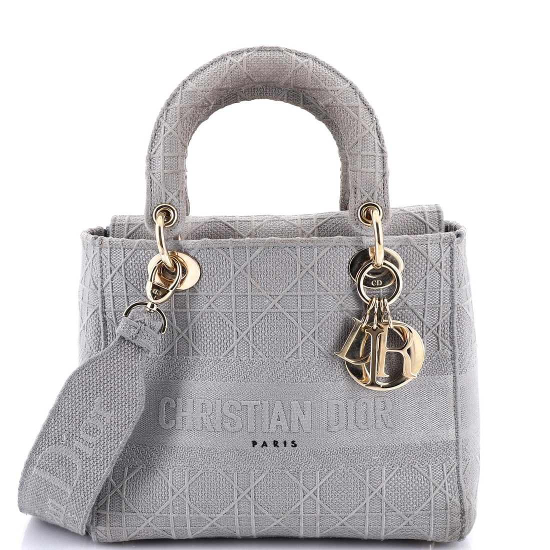 Christian Dior Lady D-Lite Bag - Cannage Embroidered Canvas Medium: Christian Dior Lady D-Lite Bag - Cannage Embroidered Canvas Medium The Christian Dior Lady D-Lite Bag is a timeless piece of luxury, boasting a stunning Cannage embroidered canvas exterior in a sleek