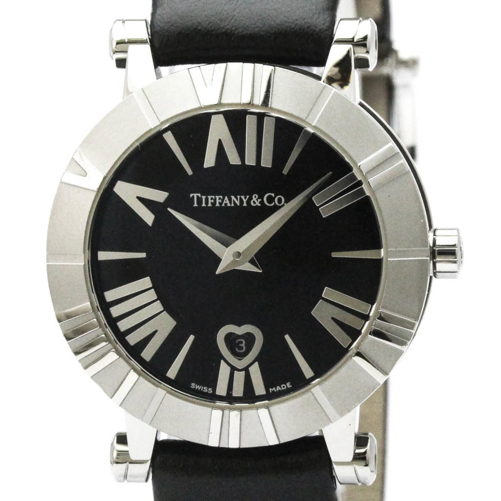 Wristwatch Tiffany: Wristwatch Tiffany A stunning Tiffany dress watch, with its sleek 30mm ceramic case and elegant leather strap, makes a statement on any formal occasion. The classic black dial adds a touch of sophisti