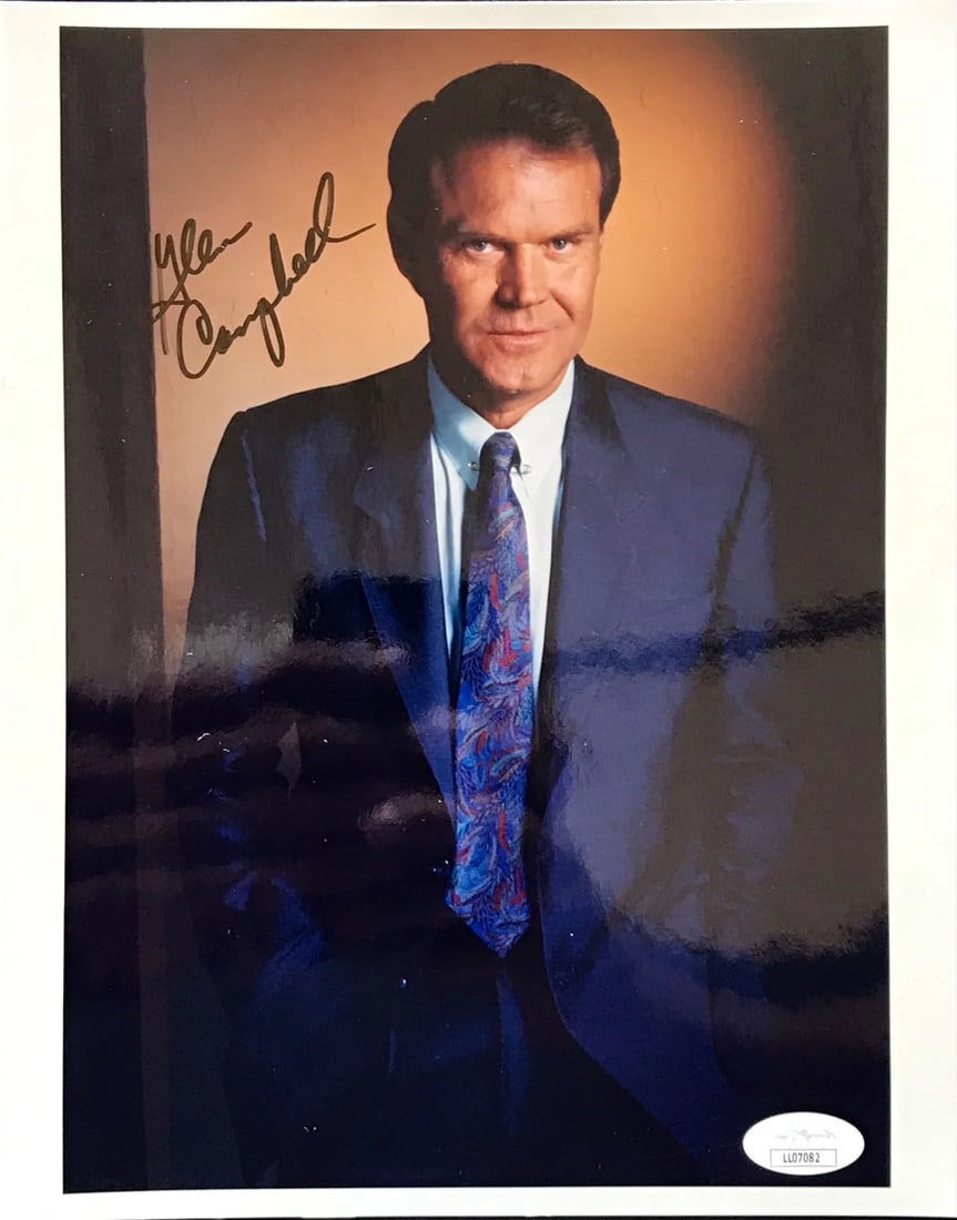 (JSA) Glen Campbell Autographed 8x10 Photo: (JSA) Glen Campbell Autographed 8x10 Photo Get ready to own a piece of music history with this authentic, JSA-verified Glen Campbell autographed 8x10 photo. Signed in black pen by the legendary countr