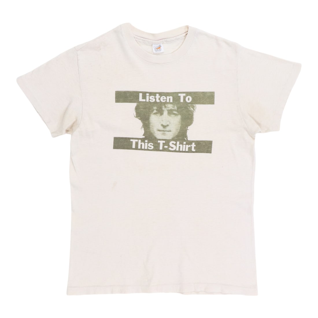 John Lennon 1970s Listen to This T-Shirt: John Lennon 1970s Listen to This T-Shirt Get ready to rock with the iconic John Lennon "Listen To This" T-Shirt from the 1970s! This vintage tee boasts original front and back graphics, making it a tr
