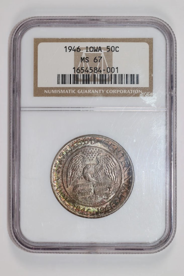 1946 Iowa Commemorative Half Dollar NGC MS67 Original Color: 1946 Iowa Commemorative Half Dollar NGC MS67 Original Color Experience the rich history of America's heartland with this stunning 1946 Iowa Commemorative Half Dollar, certified by the NGC as MS67 and