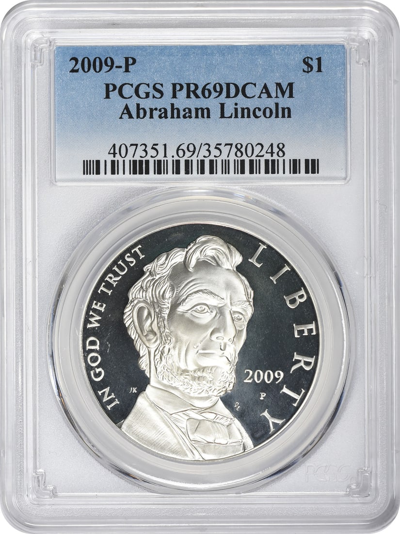 Abraham Lincoln Silver Commemorative Dollar (2009-P) PCGS Proof 69 DC: Abraham Lincoln Silver Commemorative Dollar (2009-P) PCGS Proof 69 DC Experience the majesty of American history with this stunning Abraham Lincoln Silver Commemorative Dollar, graded PR69 by PCGS in
