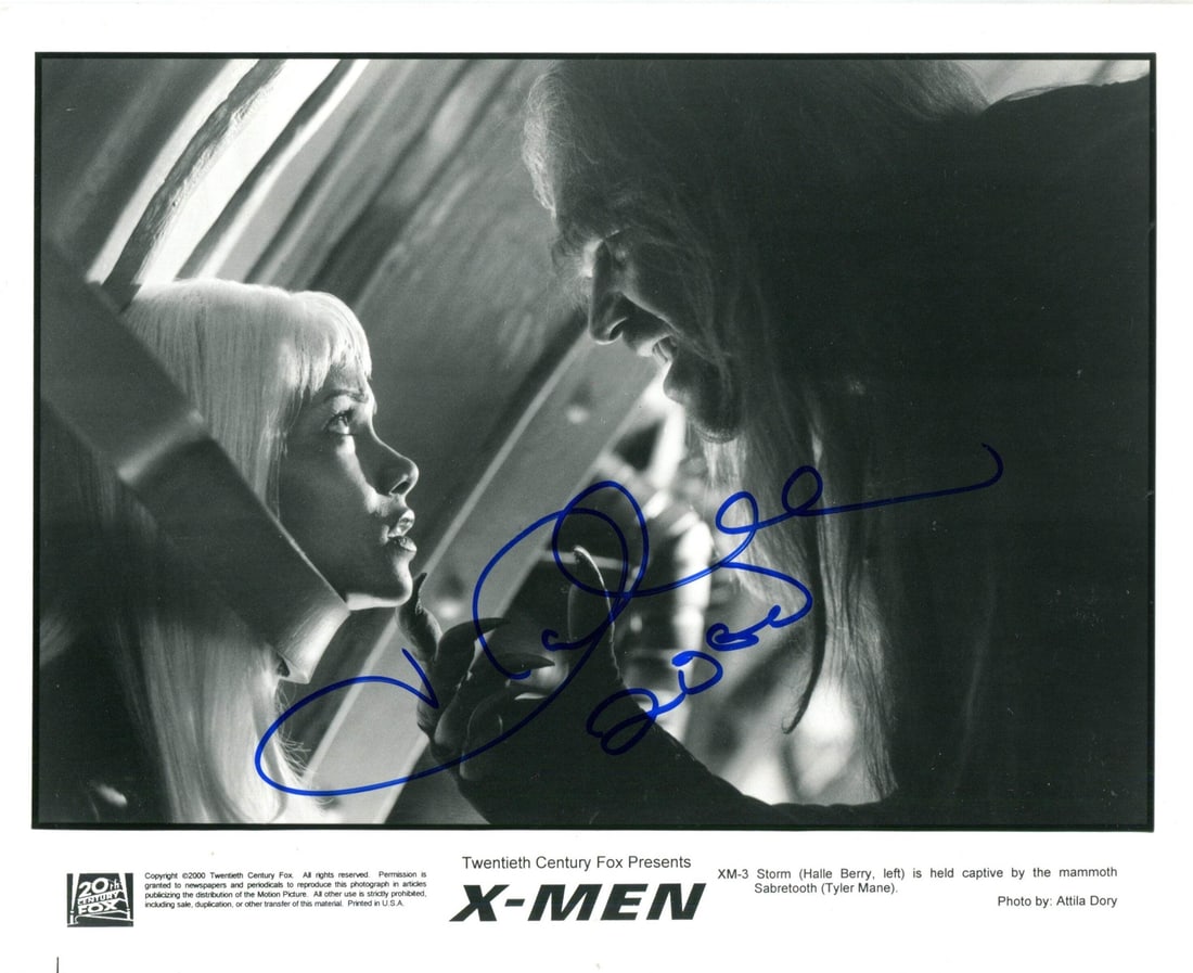 Halle Berry Autographed 8x10 Celebrity Photo: Halle Berry Autographed 8x10 Celebrity Photo Meet the ultimate Hollywood treasure - an 8x10 celebrity photo signed by the one and only Halle Berry in blue sharpie! This rare find is a must-have for an