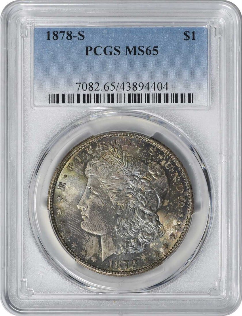 Toned 1878-S Morgan Silver Dollar MS65 PCGS: Toned 1878-S Morgan Silver Dollar MS65 PCGS Experience the majesty of the 1878-S Morgan Silver Dollar, certified MS65 by PCGS and boasting an impressive uncirculated condition. With its striking desig