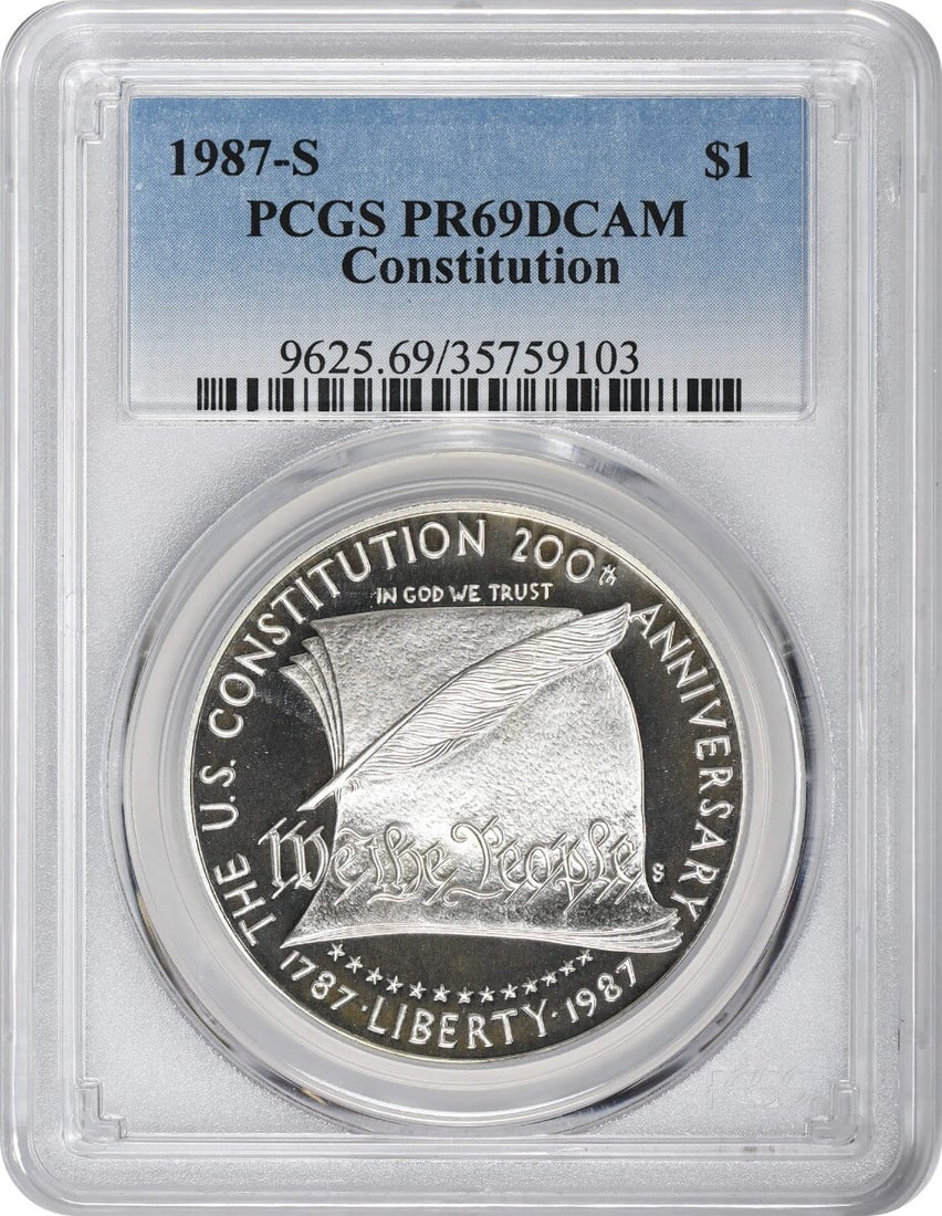 Cam 1987-S Constitution Silver Commemorative Dollar PR69DCAM PCGS Proof 69 Deep: Cam 1987-S Constitution Silver Commemorative Dollar PR69DCAM PCGS Proof 69 Deep A rare and highly sought-after 1987-S Constitution Silver Commemorative Dollar, graded PR69DCAM by the PCGS, boasts exce