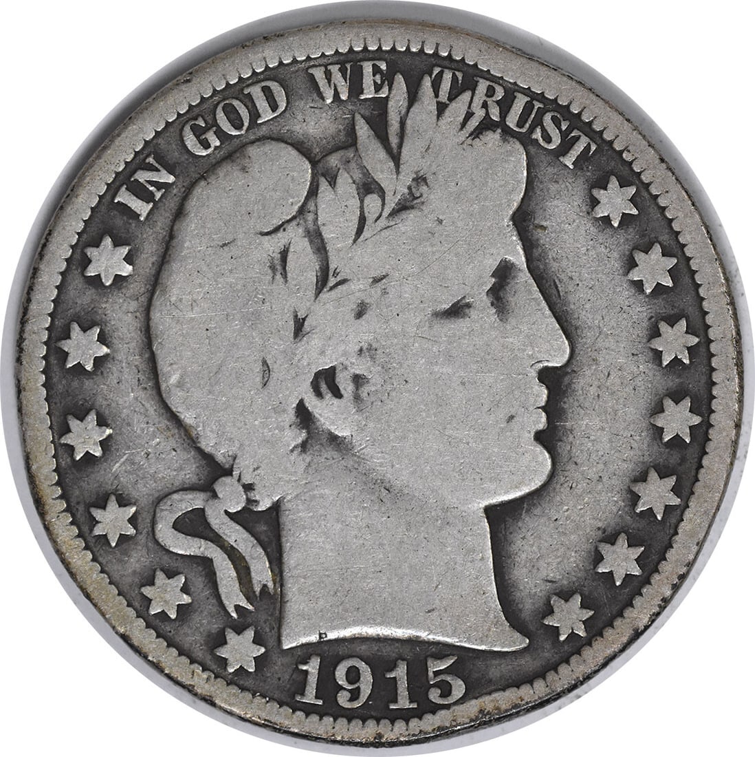 1915 Barber Silver Half Dollar - VG Uncertified: 1915 Barber Silver Half Dollar - VG Uncertified Rarity and beauty come together in this 1915 Barber Silver Half Dollar, one of the most iconic coins of its era. With its reeded edge and stunning silve