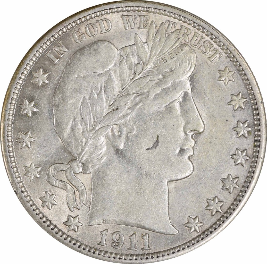 1911 Barber Silver Half Dollar - Choice AU Uncertified: 1911 Barber Silver Half Dollar - Choice AU Uncertified Experience the beauty of American history with this 1911 Barber Silver Half Dollar, featuring Charles E. Barber's iconic design and boasting a st