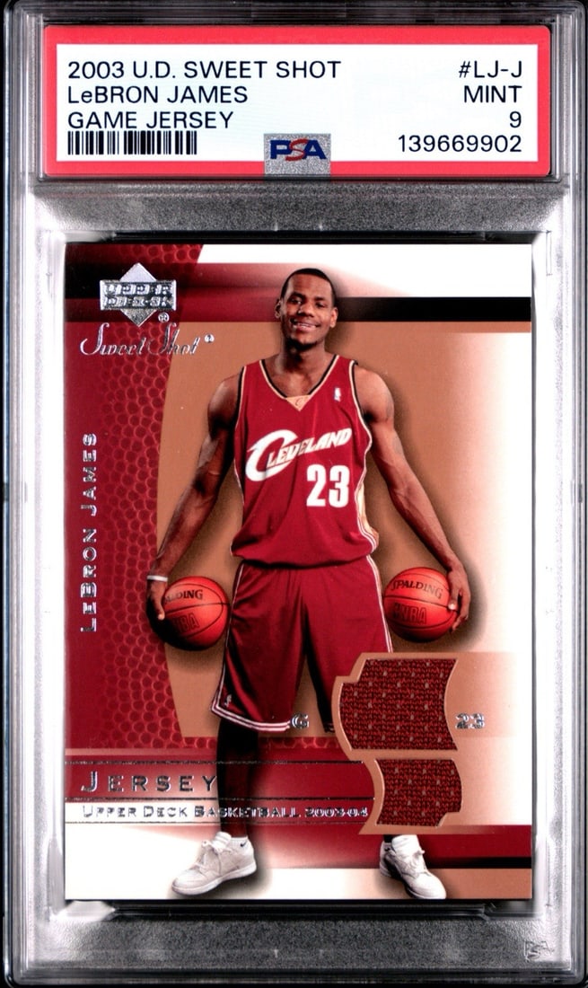 LeBron James Rookie Game Jersey (PSA 9) - 2003 Upper Deck Sweet Shot: LeBron James Rookie Game Jersey (PSA 9) - 2003 Upper Deck Sweet Shot Get ready to relive the excitement of LeBron James' early days with his 2003 Upper Deck Sweet Shot Rookie Game Jersey, graded PSA 9