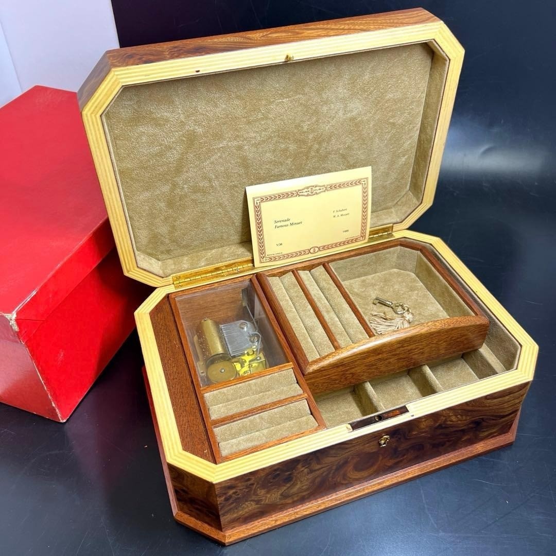 Reuge Cylinder Music Box Jewelry With Original Antique Rare Collectible: Reuge Cylinder Music Box Jewelry With Original Antique Rare Collectible A rare and exquisite find, this Reuge Cylinder Music Box is an antique collectible from Japan, boasting intricate craftsmanship