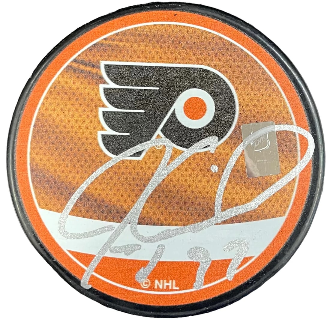 (JSA) Jeremy Roenick Autographed Philadelphia Flyers Puck: (JSA) Jeremy Roenick Autographed Philadelphia Flyers Puck Get ready to relive the excitement of Philly hockey with this authentic Jeremy Roenick autographed puck, signed in silver paint pen by one of