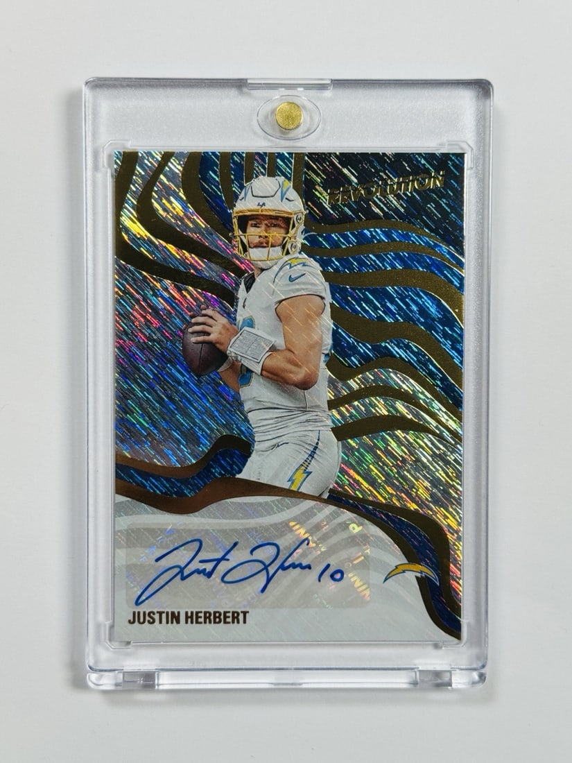 Justin Herbert #RSA-JHT Storm Auto (2025 Panini Revolution): Justin Herbert #RSA-JHT Storm Auto (2025 Panini Revolution) Get ready to collect with the 2025 Panini Revolution autograph of Los Angeles Chargers quarterback Justin Herbert! This Storm Auto card boas