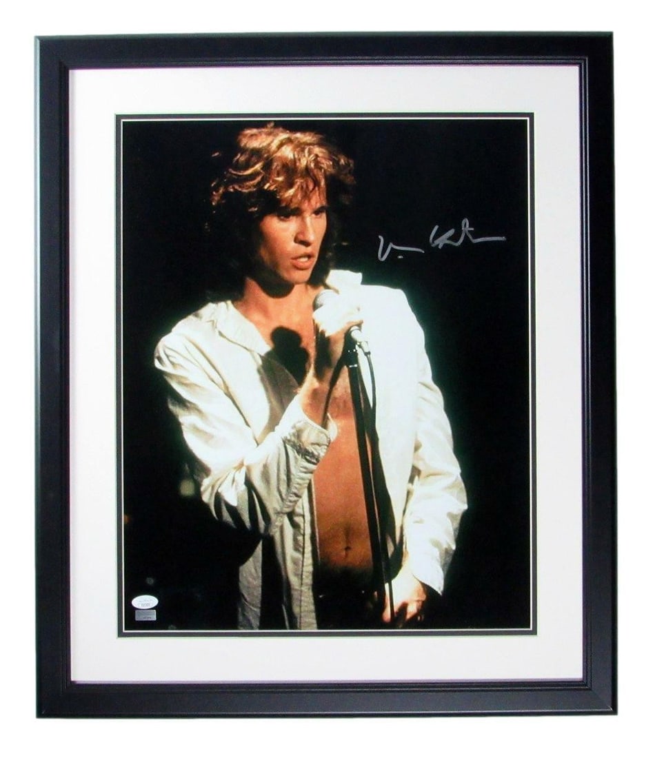 Val Kilmer Signed & Framed 'The Doors' 16x20 Photo (JSA 166668): Val Kilmer Signed & Framed 'The Doors' 16x20 Photo (JSA 166668) Meet the iconic Val Kilmer, captured in an unforgettable moment as he embodies the enigmatic Jim Morrison of 'The Doors'. This rare and