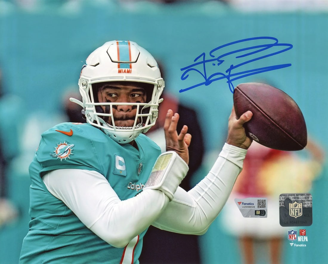 Photo Tua Tagovailoa Autographed 8x10: Photo Tua Tagovailoa Autographed 8x10 Get ready to show off your love for Tua Tagovailoa with this authentic 8x10 photo, expertly signed in blue sharpie across the front by the NFL star himself! Authe