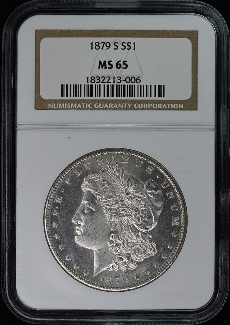 1879-S Morgan Dollar - $1 NGC MS65: 1879-S Morgan Dollar - $1 NGC MS65 Experience the majesty of America's gold standard with this 1879-S Morgan Dollar, certified by NGC as MS65. Struck in San Francisco and boasting an uncirculated cond
