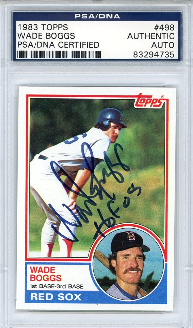 (PSA) Wade Boggs "HOF 05" Autographed 1983 Topps Rookie Card #498: (PSA) Wade Boggs "HOF 05" Autographed 1983 Topps Rookie Card #498 Get ready to own a piece of baseball history with the PSA-graded Wade Boggs 1983 Topps Rookie Card #498, signed in blue sharpie across
