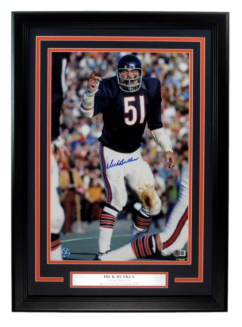 198594 Dick Butkus HOF Signed/ Auto 11x17 Photo Chicago Bears Framed BAS/ Beckett: 198594 Dick Butkus HOF Signed/ Auto 11x17 Photo Chicago Bears Framed BAS/ Beckett Meet the iconic Dick Butkus, one of the greatest linebackers in Chicago Bears history! This 11x17 photo, signed by the